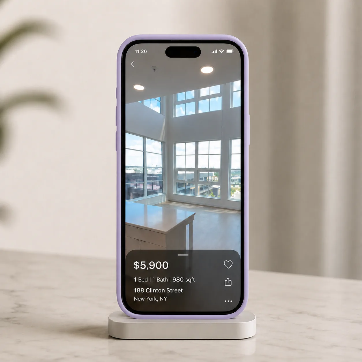 A finished apartment walkthrough playing on a phone, showing price, unit details and a share button.